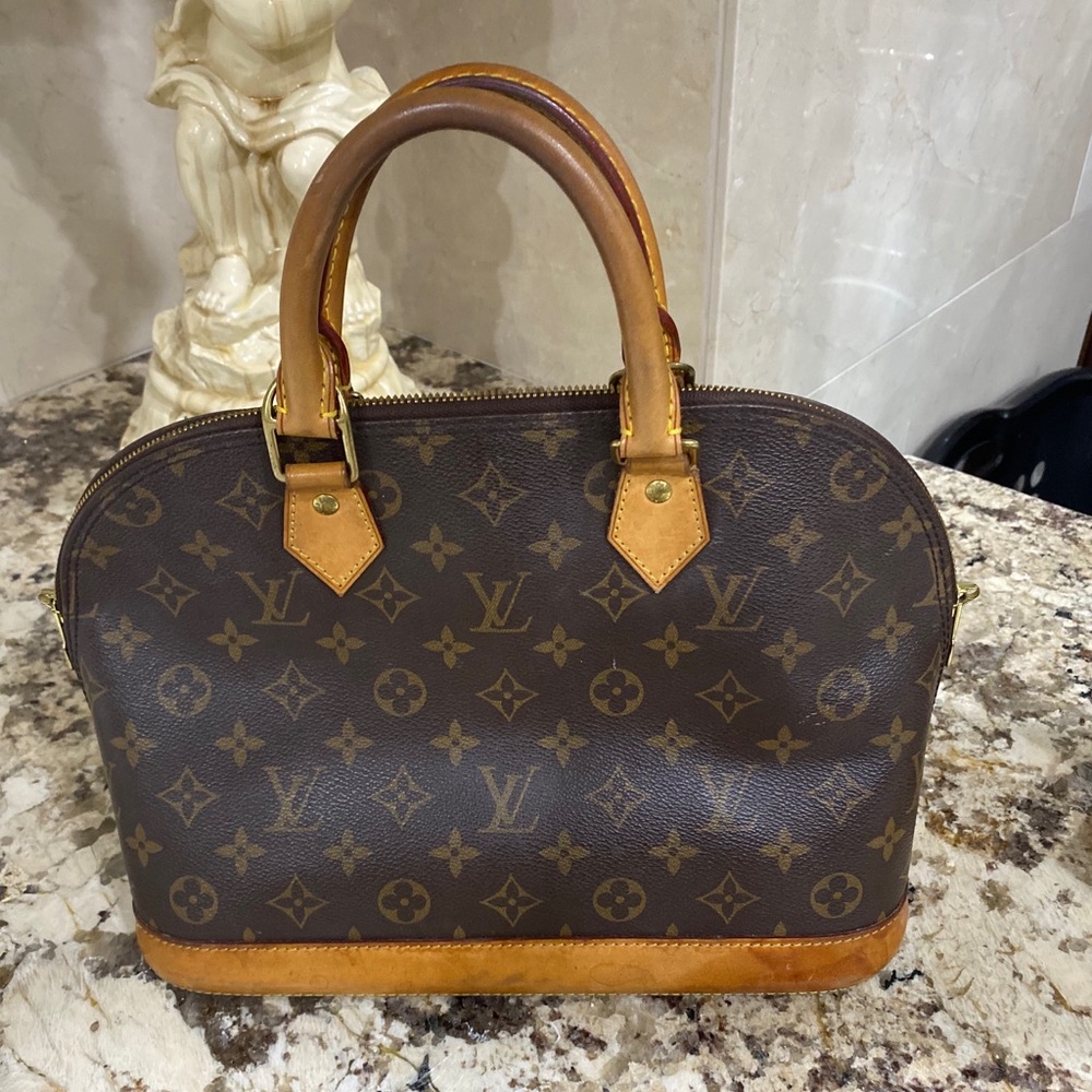 Authentic used LOUIS VUITTON ALMA BAG